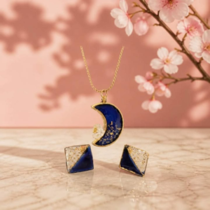Stunning Jewellery Set in Blue and Clear with gold leaf in the earrings and half moon with crystal flower